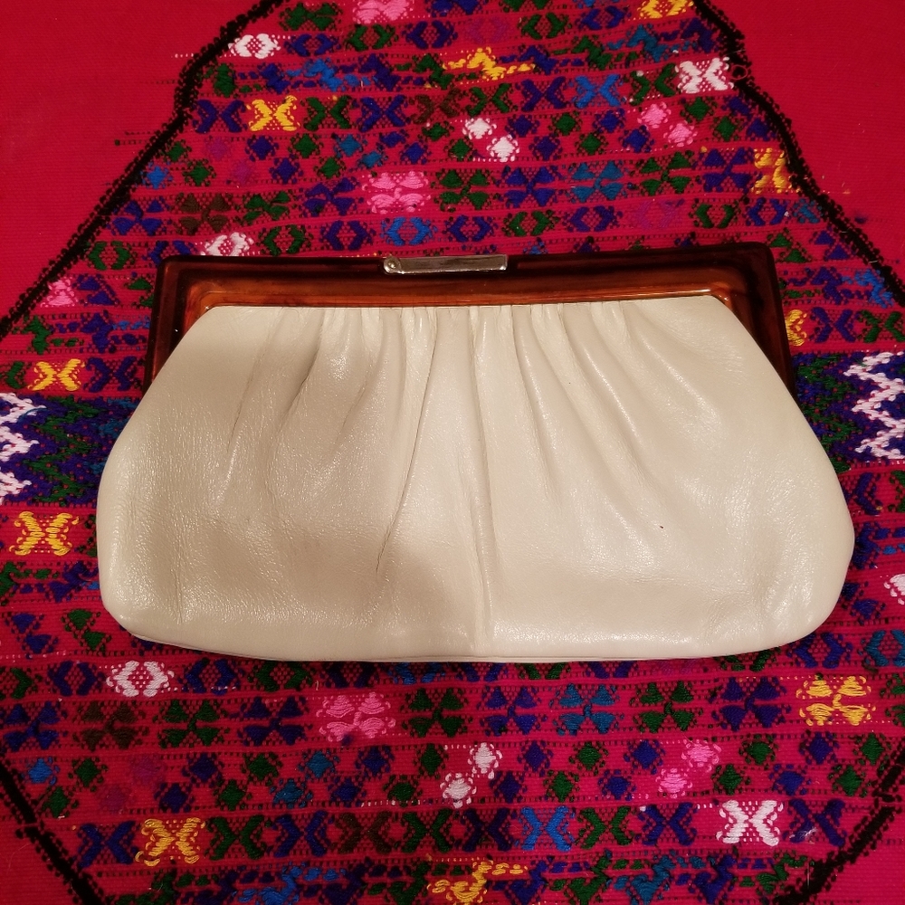 Vintage leather clutch amber opening
